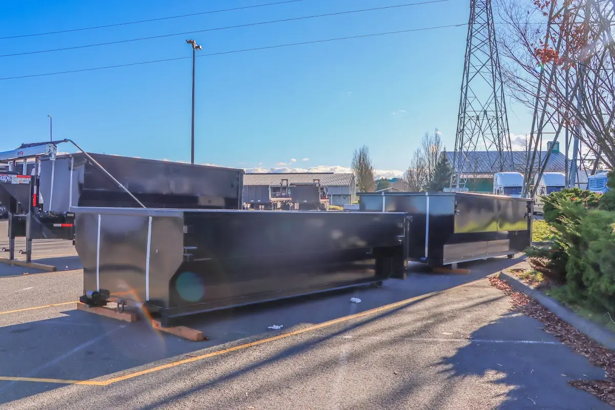 Roll-off dumpster ready for waste disposal at job site for Demolition Dumpster Rental in Northgate